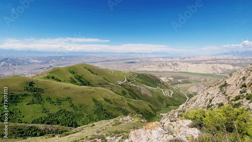 Toguz-Toro pass in Jalal-Abad region in western Kyrgyzstan. The Tien Shan and Pamir mountain systems. The highlands. View of the serpentine from the pass. 4К photo