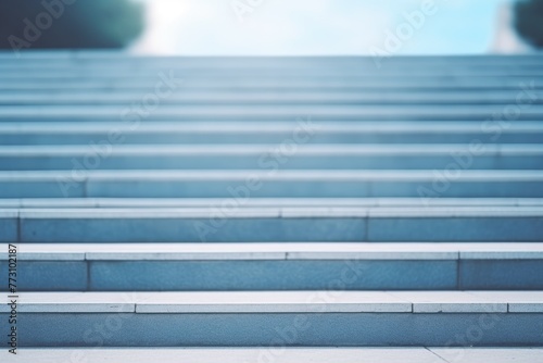 Blue urban stairway leading upwards with a soft focus, sunny background, suggesting potential. © Оксана Олейник