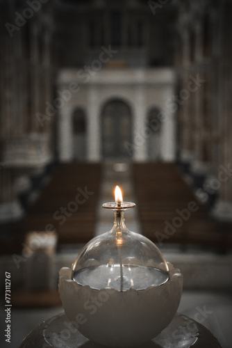 Candle in the cathedral. Bari. Italy © Marcin