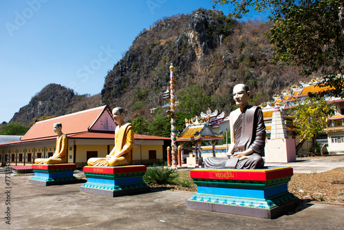 Buddhist saint holy arhat or buddhism noble monk arahant statue for thai people traveler travel visit respect blessing at Wat Thep Prathan or Khao Isan temple on March 31, 2024 in Ratchaburi, Thailand photo