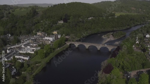 Aerial view of Dunkeld Bridge, old town buildings and River Tay scenery in Scotland, United Kingdom photo