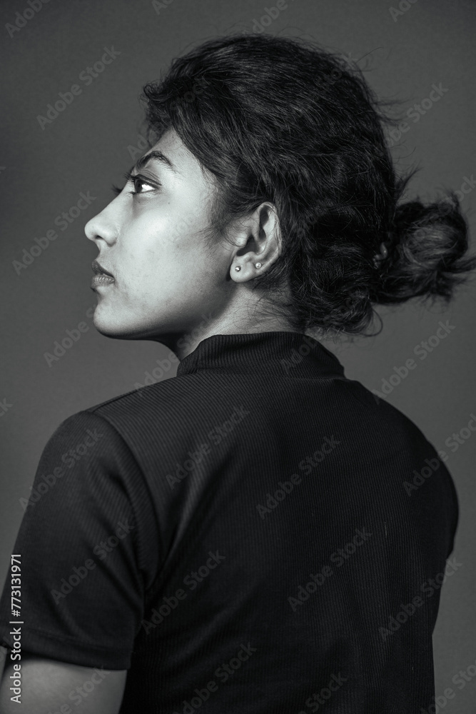 A woman with long hair and a black shirt