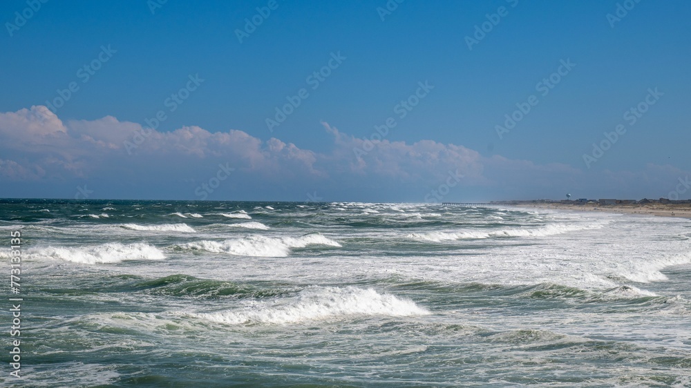 Scenic view of ocean waves on a sunny day