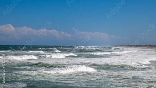 Scenic view of ocean waves on a sunny day