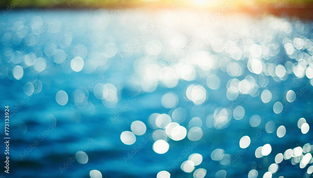 © Your Hand Please - blurred blue background with water highlights, evoking tranquility and warmth in nature