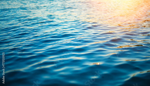 blurred blue background with water highlights, evoking tranquility and warmth in nature