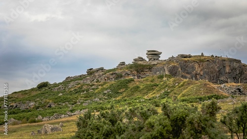 Cheesewring rock formation on the hilltop. Minions, Cornwall, England. photo