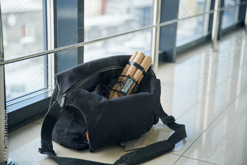 Close up view of time bomb in bag in the public place photo