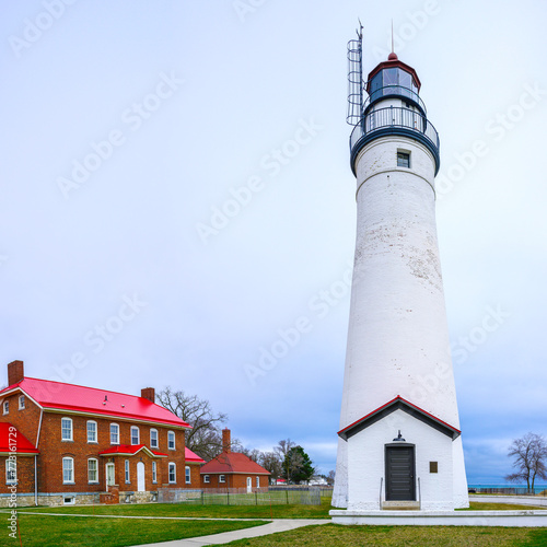 Fort Gratiot Lighthouse, the second oldest lighthouse in Great Lakes, built in 1829 on the riverbank of the St. Clair River in Port Huron, Michigan, USA photo