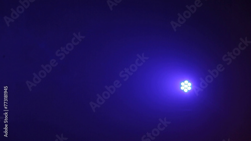 Abstract blue and purple background with lights and smoke. Colorful background