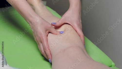 massage of a woman's foot with fingers