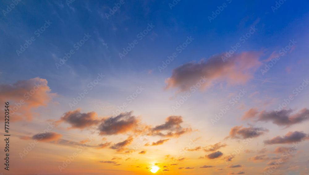 Clouds and sky in the evening,Real amazing panoramic sunrise or sunset sky with gentle colorful clouds. Long panorama, crop it