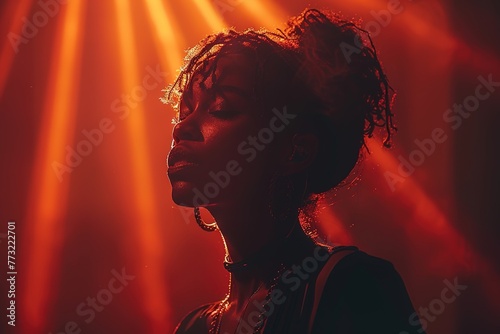 Silhouette of a jazz singer performing on a concert
