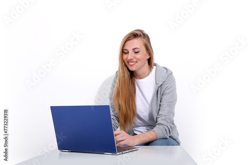 girl with laptop on white background © Vitalii