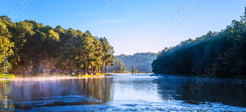 camping and travel  Beatiful nature panorama view of Pang Ung lake in the mist at sunrise.