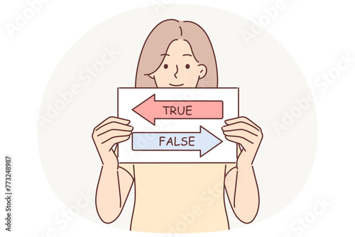True and false sign in hands woman calling to make decision and make right choice from two options