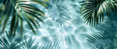 Sea background with palm leaves and shadows on blue water. High-resolution © fillmana