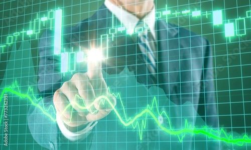 Stock graph business financial chart and hand © BillionPhotos.com
