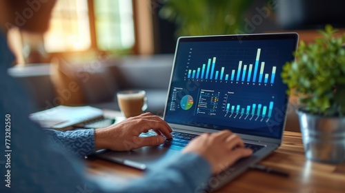 Focused Business Analysis at Work, Close-up of a professional analyzing business data on a laptop, with insightful charts and graphs illuminating the screen in a cozy workspace