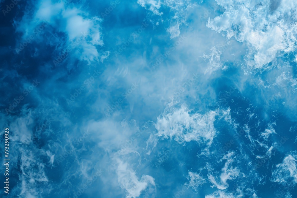 Wispy clouds gracefully dance across the vast expanse of a serene blue sky, creating a tranquil and peaceful scene. Wispy clouds gracefully dance across the vast expanse of a serene blue sky, creating a tranquil and peaceful scene.