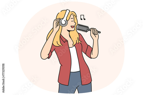 Smiling woman in headphones sing in hairbrush. Happy girl have fun enjoy singing with brush in hands. Hobby and entertainment. Vector illustration.