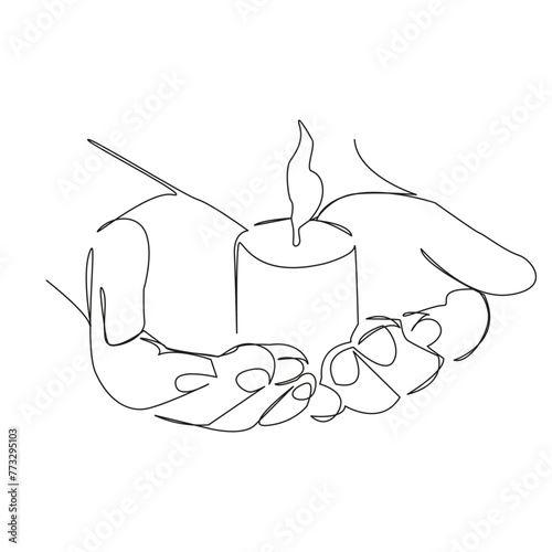 hands with a candle