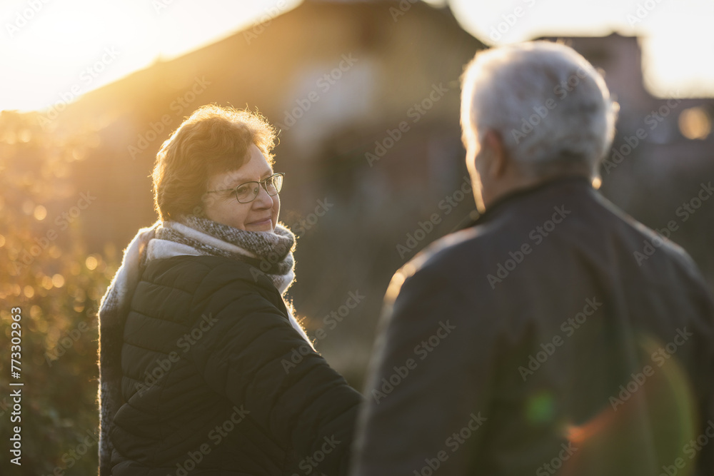 Senior Man and a Woman Walking Together