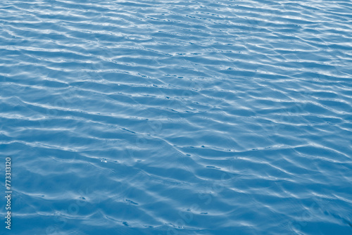 Blue expanse of water at sea as abstract background.