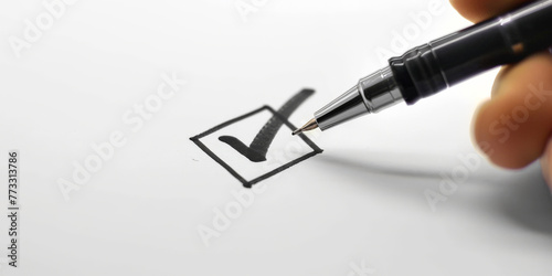 close up a hand mand with pen writing on paper with check mark icon isolated white background, photo