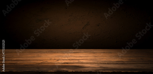 A wooden table stands in the center of a dimly lit room, surrounded by darkness. The room resembles a landscape at dusk, with tints of sky and hints of clouds