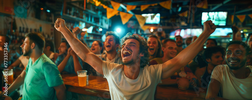 happy smiling emotions of football fans in a sports bar celebrating a goal scored