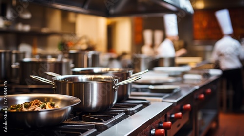 Cookware and Chef's Hat in a Bright Restaurant Kitchen