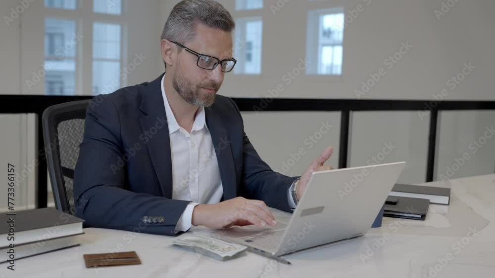 Middle aged businessman working with laptop in office. Hispanic business man using laptop. Millennial man using laptop at office workplace. Ceo manager office worker business people working at office. Middle aged businessman working with laptop in office. Hispanic business man using laptop. Millennial man using laptop at office workplace. Ceo manager office worker business people working at office.