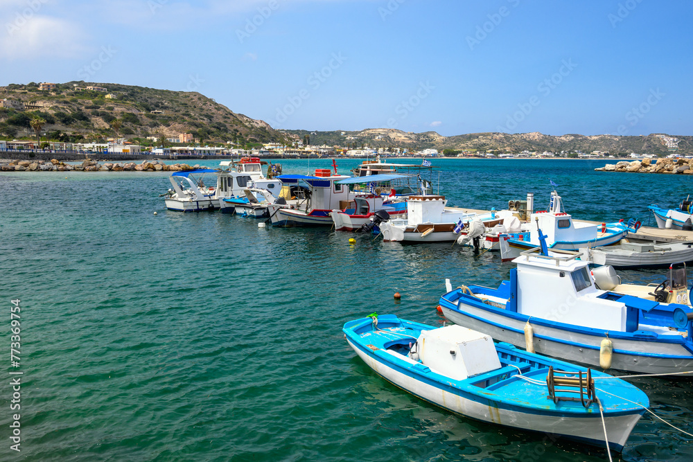 Colorful fishing boats moored in the port of Kefalos on the island of Kos. Greece