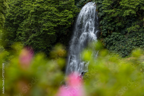 Veu da Noiva (Brides Veil) waterfall in Ribeira dos Caldeiroes, Nordeste, Sao Miguel island, Azores, Portugal photo