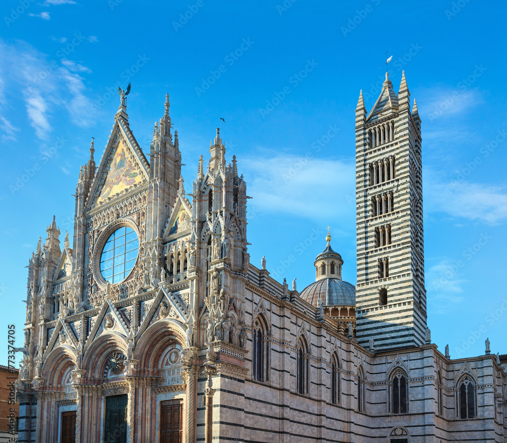 Naklejka premium Siena Cathedral (Duomo di Siena), main facade completed in 1380. Siena is italian medieval town, capital of Siena province, Tuscany, Italy. Historic centre is UNESCO World Heritage Site.