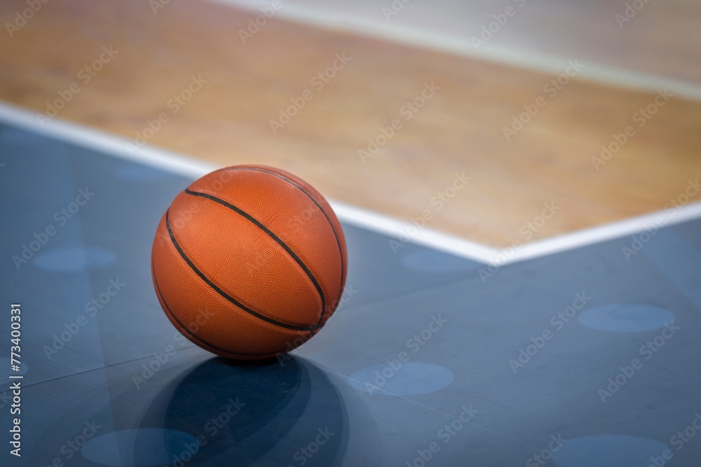 Basketball on Floor in Sports Court - 4K Ultra HD Resolution