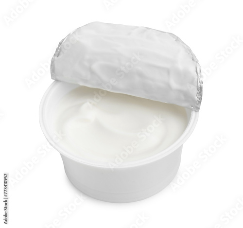 Delicious natural yogurt in plastic cup isolated on white