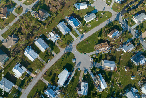 Badly damaged mobile homes after hurricane Ian in Florida Southwest region residential area. Consequences of natural disaster