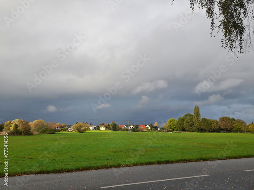 Schauerwolke über Dorf photo