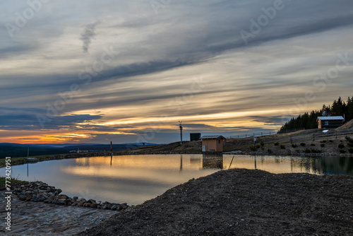 Water reservoir in sunset color evening near Bozi Dar town in evening