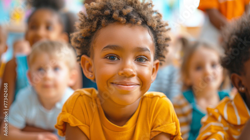 Portrait of cute african american little boy smiling in kindergarten
