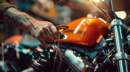 Capturing the intense focus of a mechanic's hands as they delicately measure the oil of a brightly colored orange motorcycle