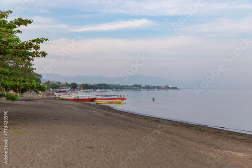 BALI, LOVINA, INDONESIA - NOVEMBER 10, 2023: Lovina beach at early morning