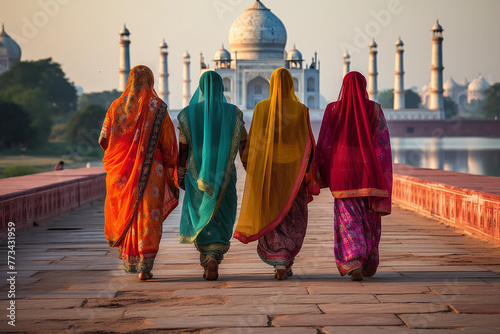 Indian women in colorful sari and temple