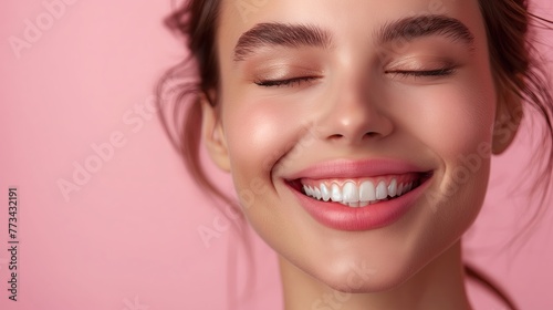 A closeup of a womans smiling mouth, nose, and eyelashes on a pink background. dental illustration