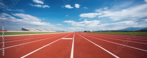 Empty running track with blue sky