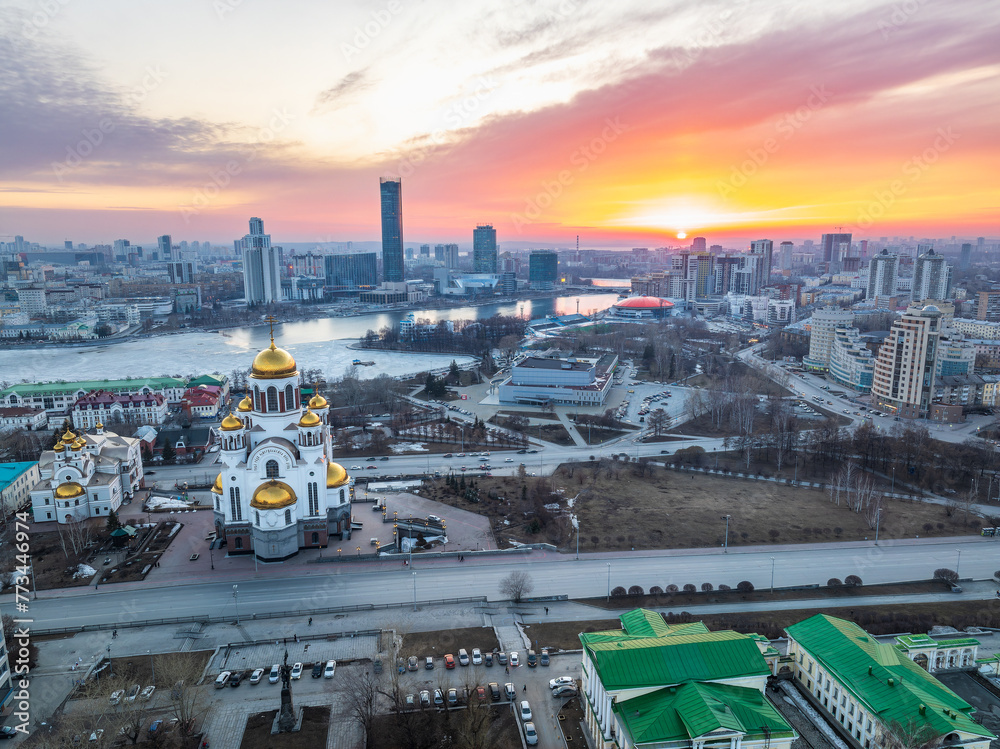 Spring Yekaterinburg, Temple on Blood and Church of St Nicholas in sunset. Aerial view of Yekaterinburg, Russia. Translation of text on the temple: Honest to the Lord is the death of His saints