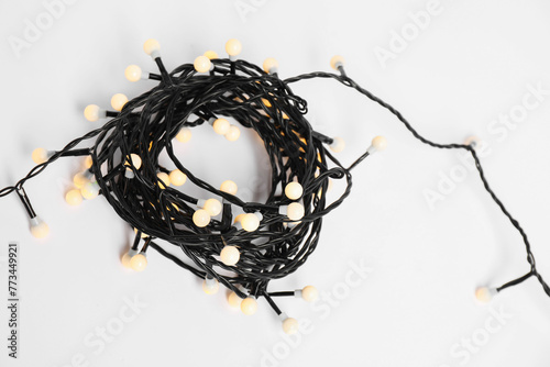 Beautiful Christmas lights on white background  top view