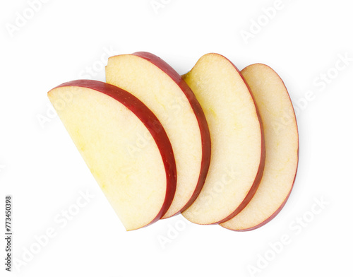 Slices of ripe red apple isolated on white, top view